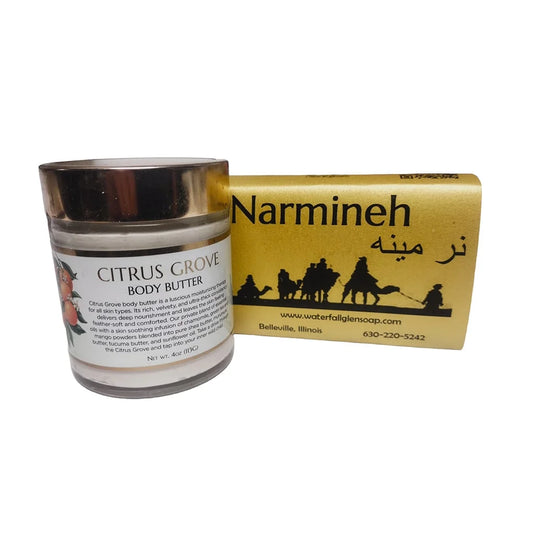 citrus grove body butter jar next to a narmineh bar soap with an yellow wrapper