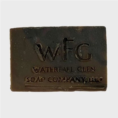 brown and black colored mistique bar soap