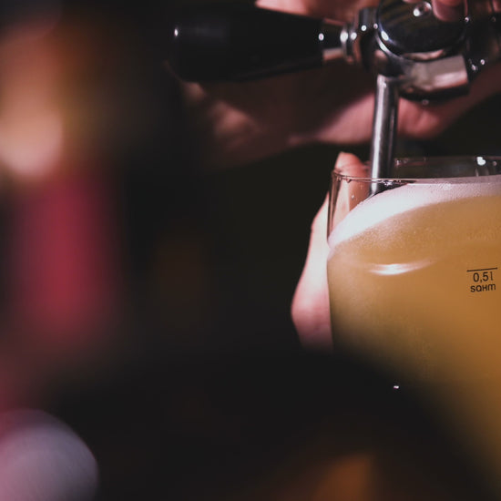Beer being poured into a beer glass then transitioning to the Krampus Wash bar soap.